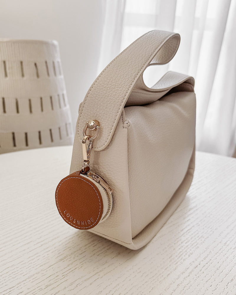 Louenhide Airlie bag charm tan detail view