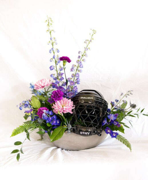 The Sport Collection_Helmet / Bring in your own personal items as pictured & we'll use them to create a custom arrangement.__The Floral Fixx_The Floral Fixx
